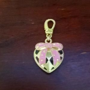 MacKenzie-Childs retired Christmas Heart  charm.